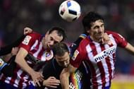 Diego Godin & Stefan Savic makes a defensive clearance